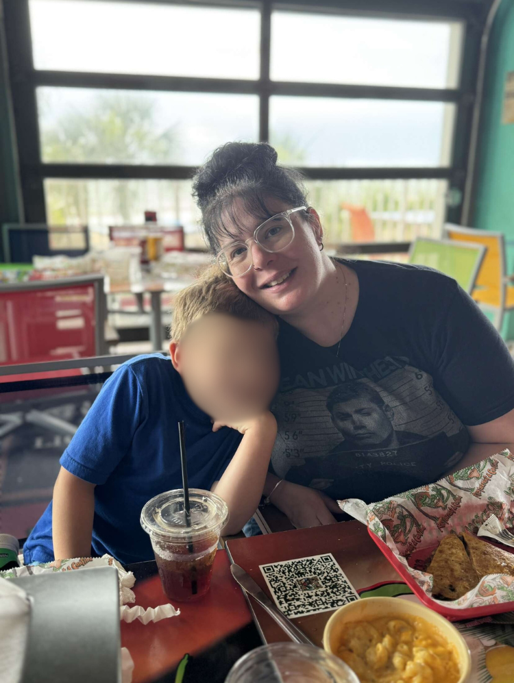 Woman and boy dining