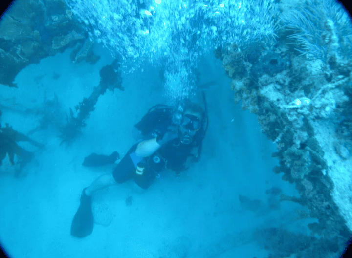 Brett exploring a shipwreck during training